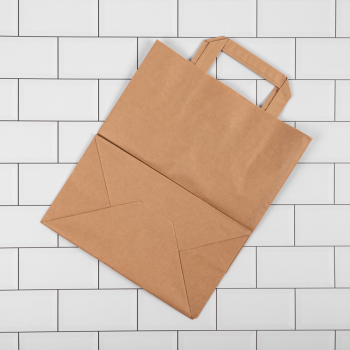 Бурый пакет с плоской ручкой, 70 г/м², 28*15*32 см Бурый пакет с плоской ручкой, 70 г/м², 28*15*32 см